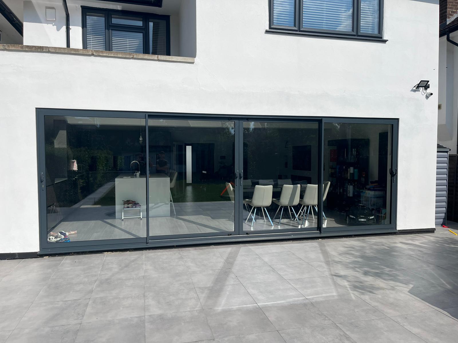 Completed bifold door installation for a Hertfordshire home by Andrews Glass